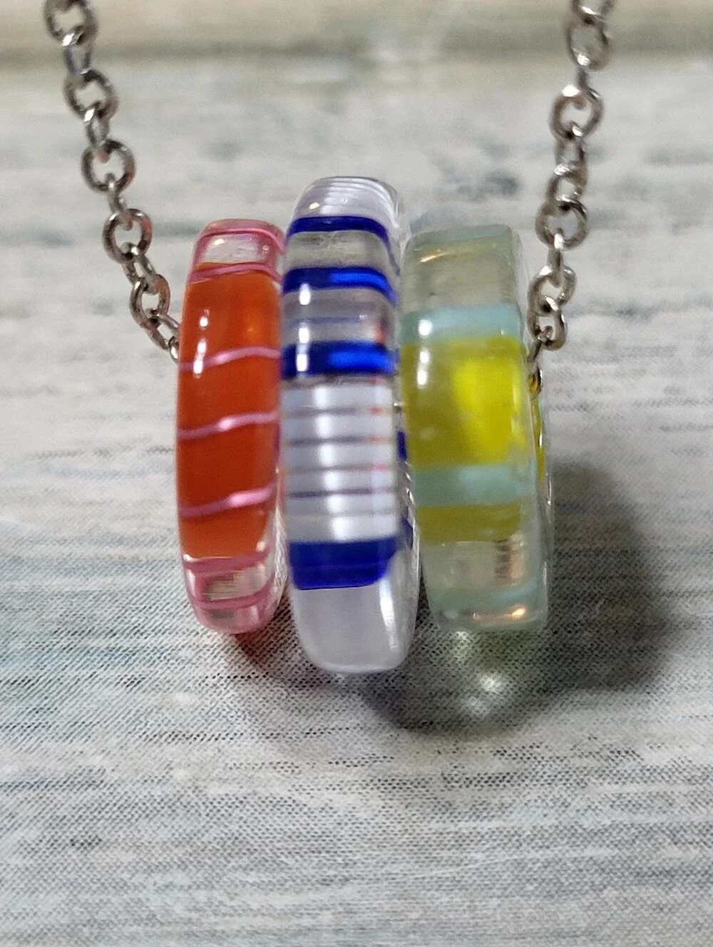 Silver Chain Necklace with Multicolor Three Glass Ring Pendants.
